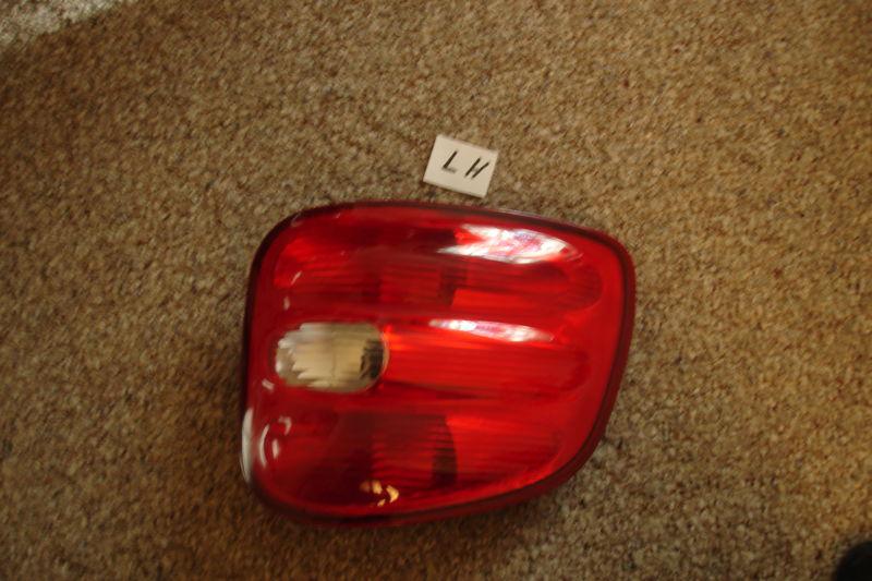 1997-2000 ford f150 flareside  left side tail light