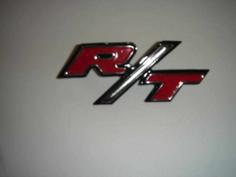 Mopar 70 charger r/t headlight door emblem  new