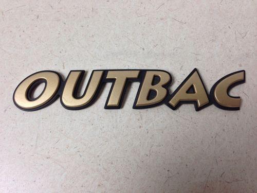 Subaru outback gold emblem