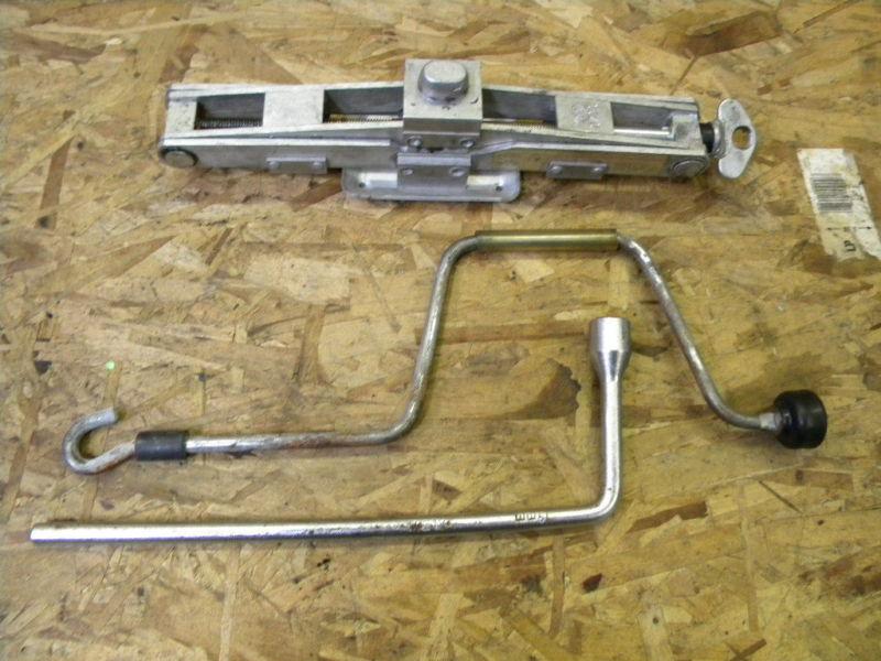 91 porsche 911 964 wheel tire jack with crank handle and lug nut tool