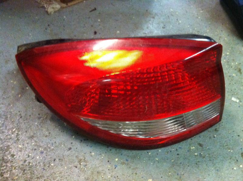 2004 kia rio drivers side tail light 