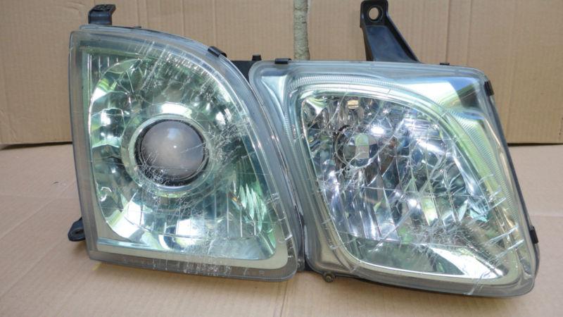 03 04 05 06 07 lexus lx470 right passenger headlight lamp oem used