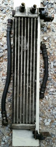 Used oil cooler for 1983 mazda rx-7 with hoses and rubber mounts