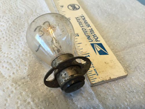 Old car 6 volt, light bulb,   pn 2330.  headlight.   item:  0055