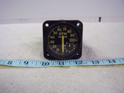 % tach indicator by kollsman instrument type e-25  used condition as removed