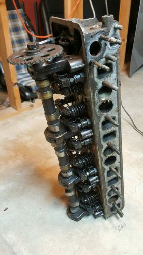 230s mercedes-benz head with camshaft and valve train.