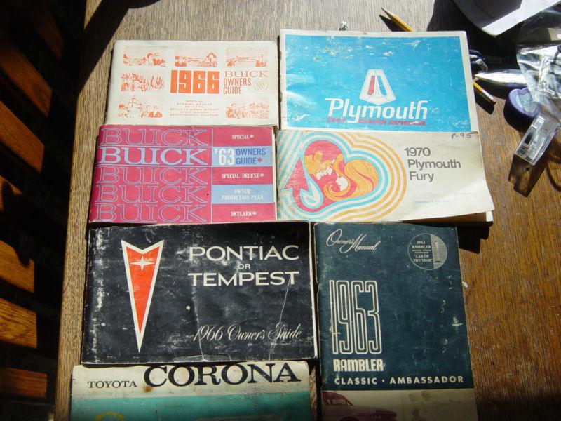 8 vintage manuals 70 fury,74 rx7,toyota carona,66 pontiac