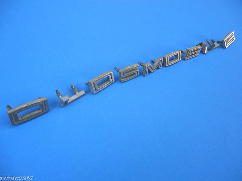 Oldsmobile letter emblems 1960's 1964 oldsmobile cutlass oem hood letter set 