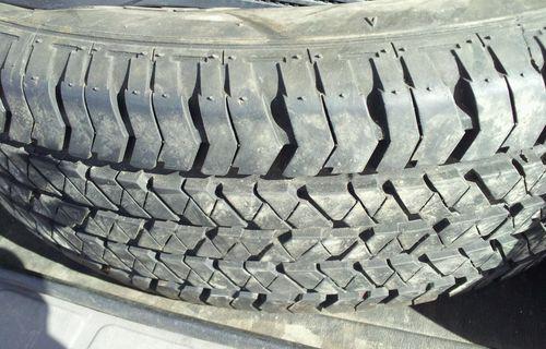 (1) bridgestone 205/70 r15 all season.