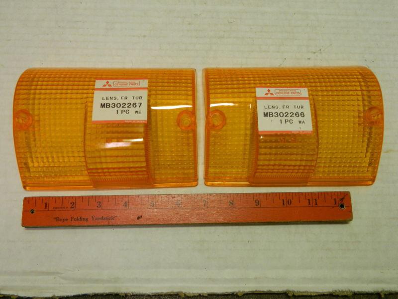 Pair mitsubishi lens amber: lens, fr tur mb 302266 + mb302267 model