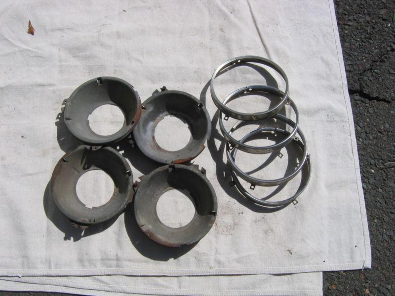 1964 chevy headlight mounting bucket and rings 8 pc set 1958-1966 chevy impala