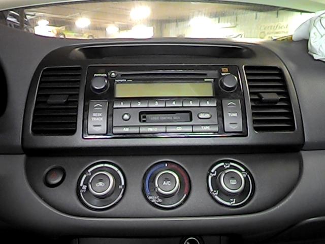 2006 toyota camry radio trim dash bezel 2631668