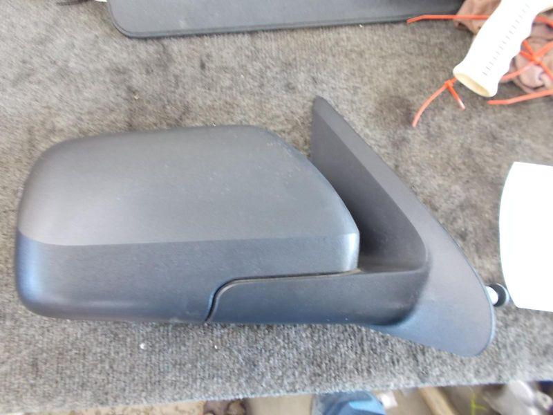 Ford escape r door mirror power; w/o heated glass; r., black molded-in-color c