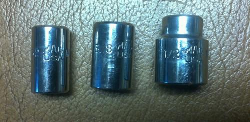 3 like new mac tools 1/4" drive shallow chrome sockets.  1/2", 3/8" and 11/32"  