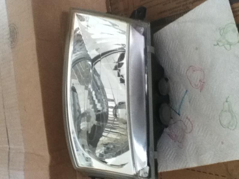 1999-2004 nissan pathfinder left driver side headlight lamp oem