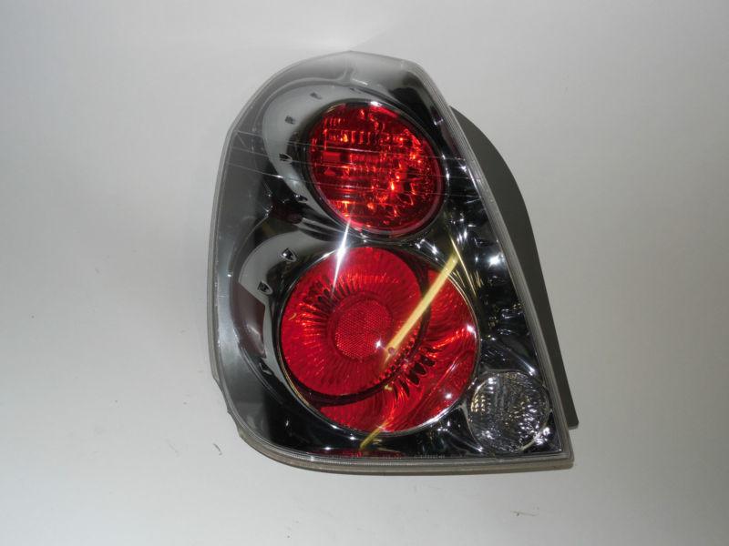 05 06 nissan alitma oem left tail light nice!