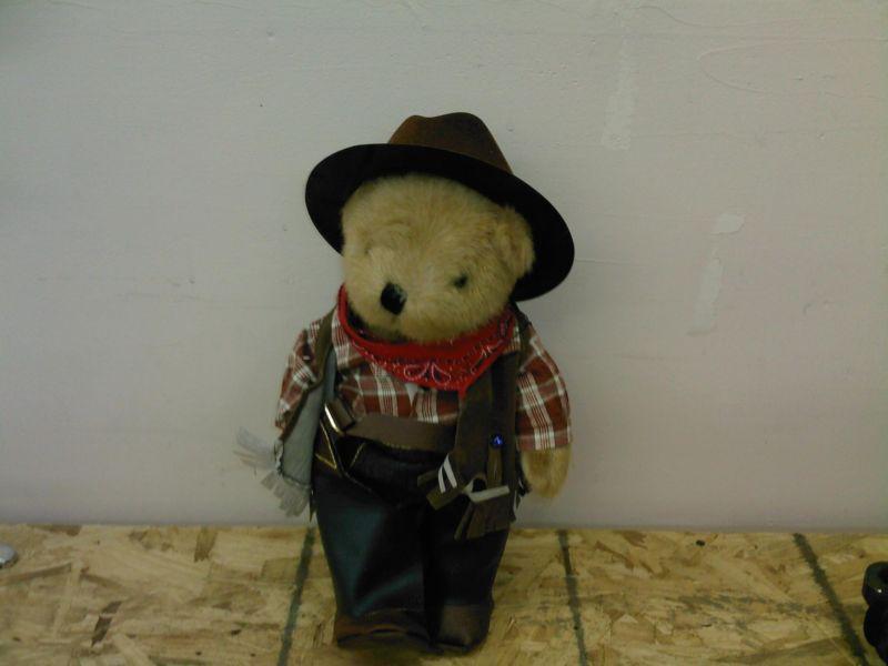 Brown bear with cowboy hat stuffed animal