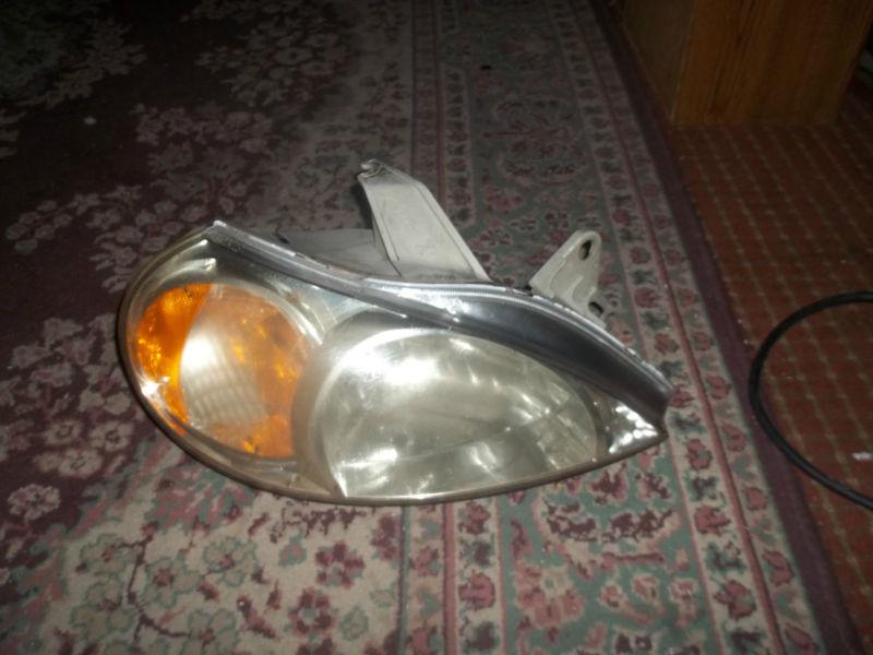 For 00-02 kia rio headlight headlamp passanger side rh used