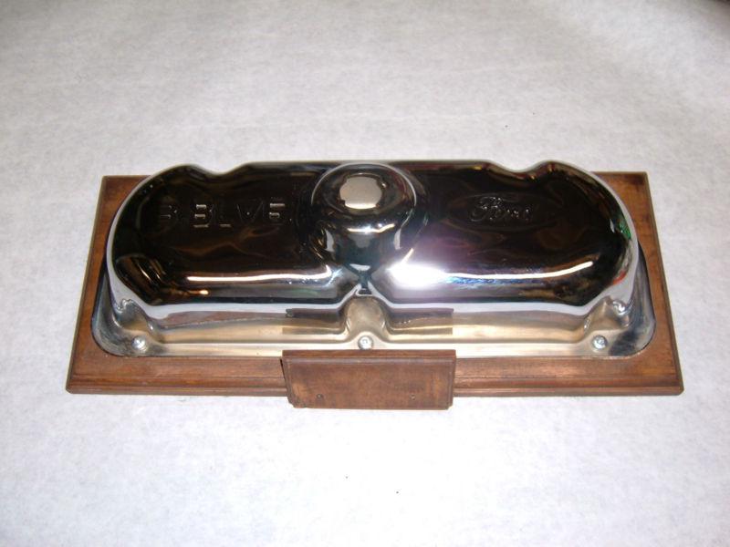 Ford 3.8 chrome valve cover mounted on display plaque