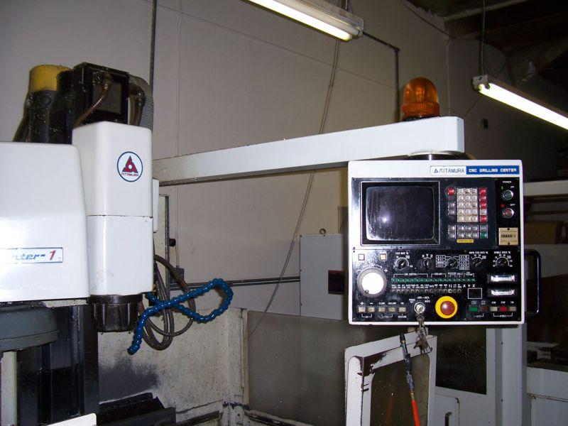2 cnc milling machine centers kitamura mycenter 1 and kitamura v-3000 machine 