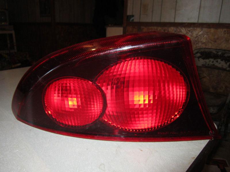 01 02 03 04 05 dodge stratus driver side rear brake tail light lamp oem