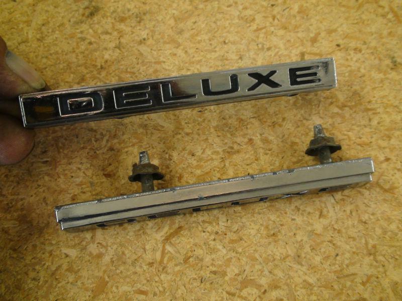 67-72 chevy pick up nice chrome,black letter "deluxe" emblem, good posts w/ nuts