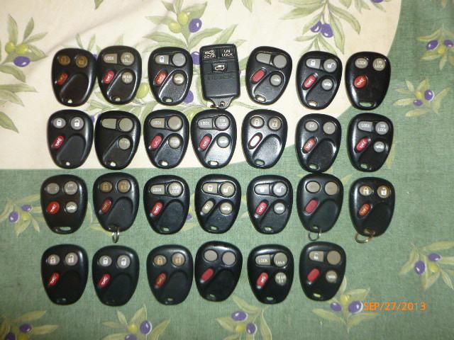 Lot of 27 mixed gm remotes