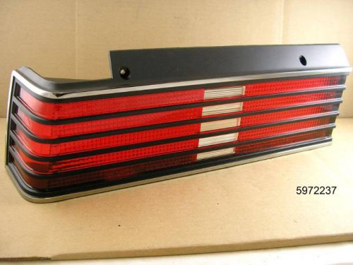 1982 1983 pontiac j2000 sunbird nos tail lamp lens left hand, 5972237