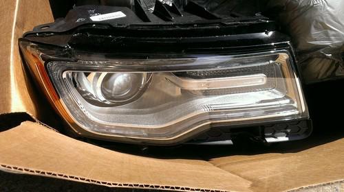 2014 jeep grand cherokee head light