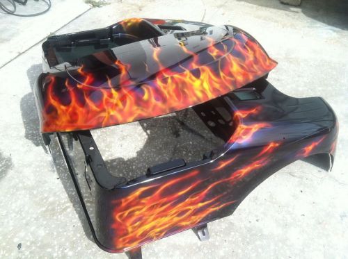 Realistic fire paint job on an ez go txt or rxv golf cart body.