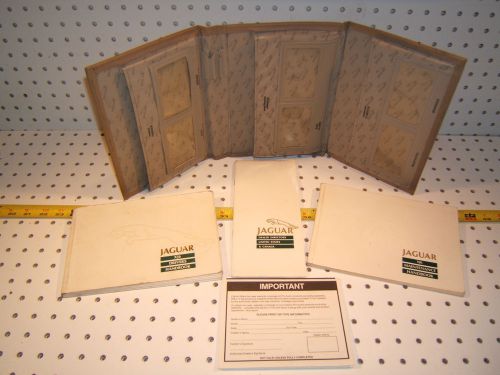 Jaguar 1990 xj6 owner hand 1 set of 4 books / papers &amp; jaguar leather tan 1 case