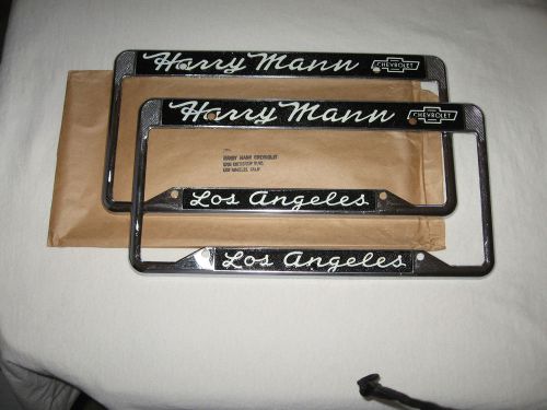 Harry mann license plate frame pair - nos - los angeles - chevrolet / corvette