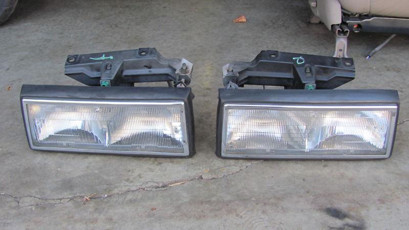 1991 1992 1993 cadillac deville fleetwood headlights headlamps pair lh rh oem