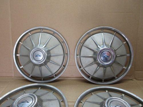Vintage set of 4 wheel covers hubcaps for corvair