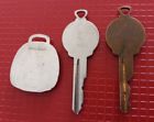 Lot of vintage 2 oldsmobile globe keys and 1 oldsmobile key fob