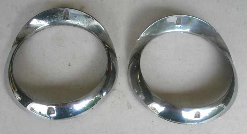 55 chevy headlight bezels [pair]  item#2