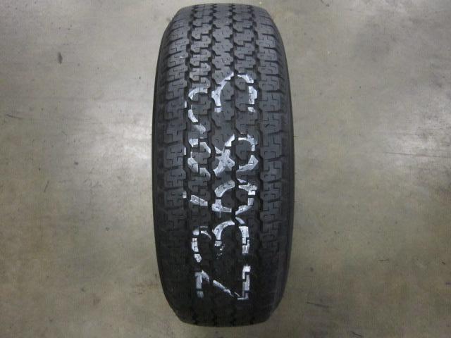 One bridgestone dueler h/t 689 245/65/17 tire (z3683) 8/32