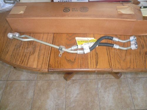 1996 - 2005 gm engine oil cooler line pipe p/n 15194579 blazer/jimmy/bravada nos