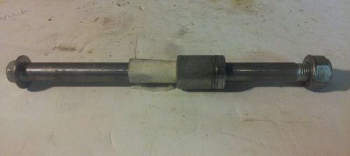 91 honda cb250 nighthawk - front axel compete w/ spacer - great shape!!