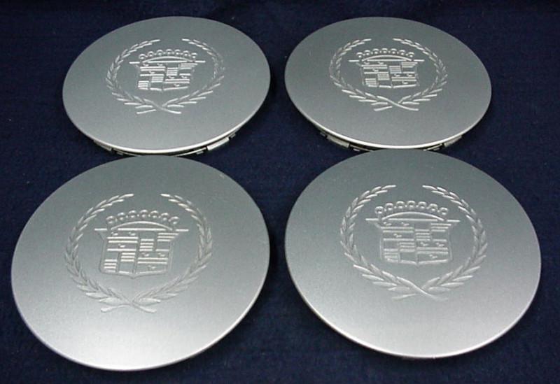 Cadillac seville 95 eldorado 95-02 silver center caps - set of 4 