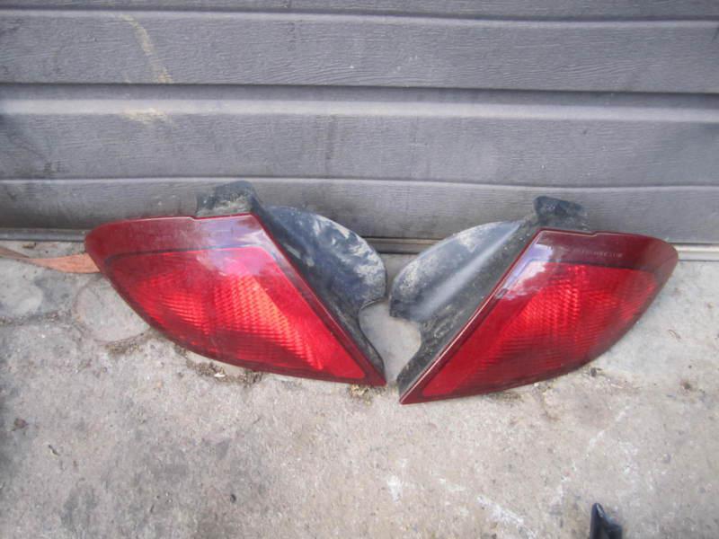 03 04 05 sunfire driver tail light 2 dr qtr mtd