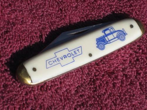 Single blade chevy novelty pocket knife with chevrolet bowtie emblem badge