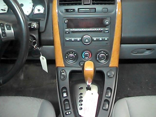 2006 saturn vue radio trim dash bezel 2604776