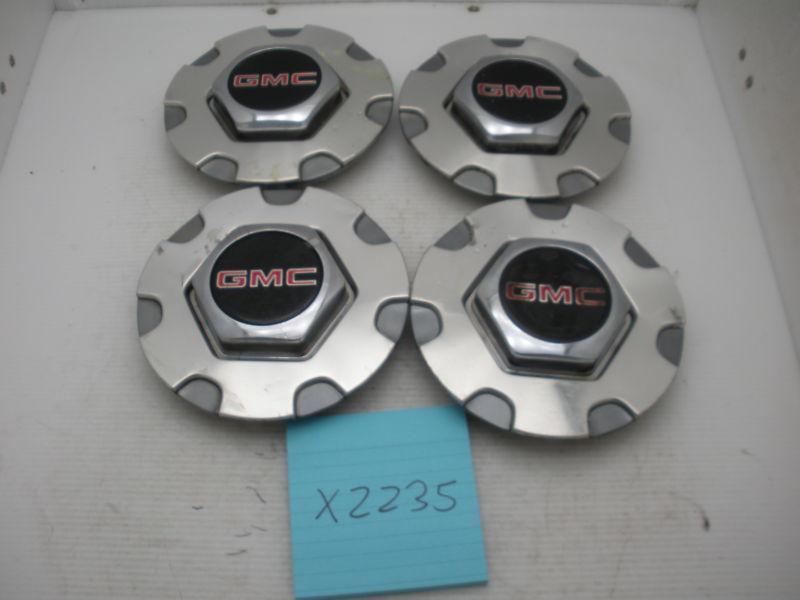 Set of 4- 98 gmc jimmy envoy wheel center cap  15715635  wheel hubcap