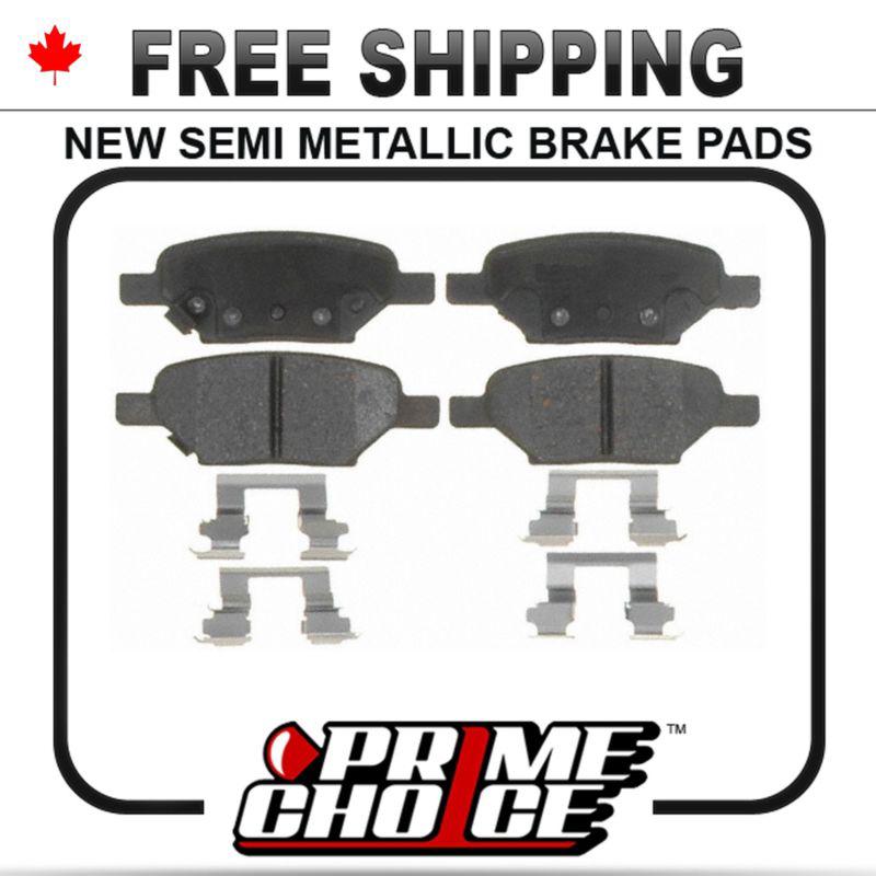 New premium complete set of rear metallic disc brake pads with shims