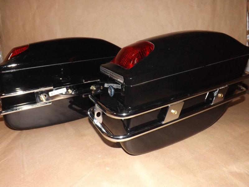 Customer returned pair black motorcycle hard saddlebag trunk bag light bracket