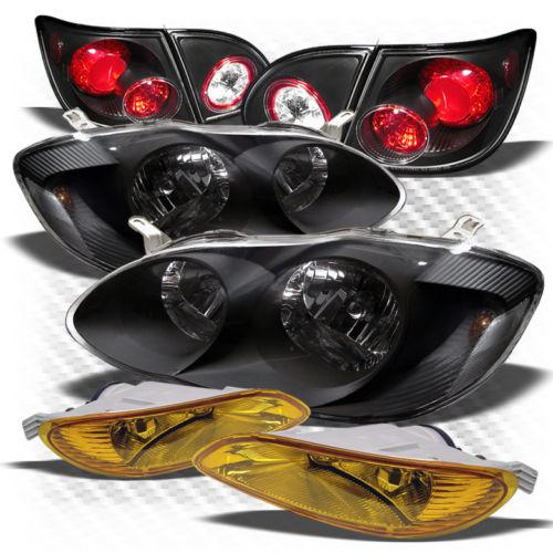 05-08 corolla black headlights + altezza style tail lights + yellow fog lights