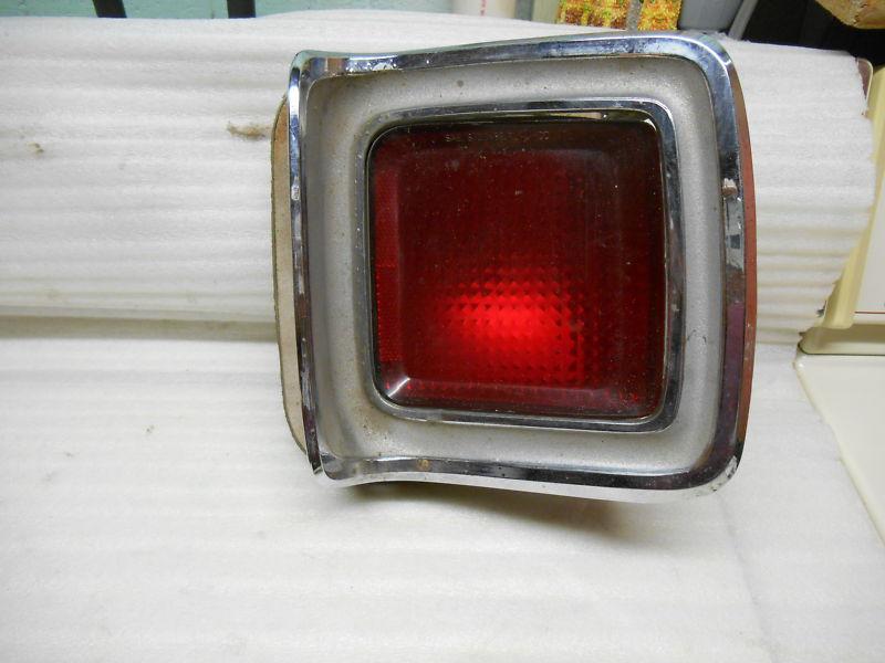 1969 plymouth road runner passenger side tailight and bezal bezel