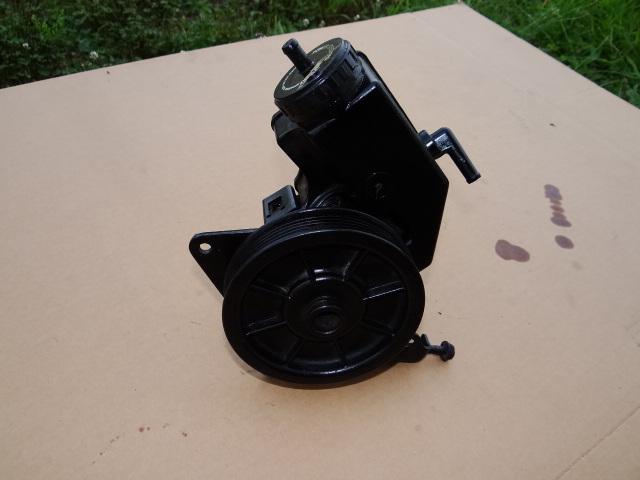 Jeep cherokee power steering pump w/ pulley and bracket.  