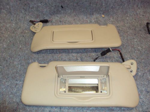 2005 cadillac cts pair 2 beige sun visors w/homelink oem